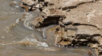 sediment buildup from pressure